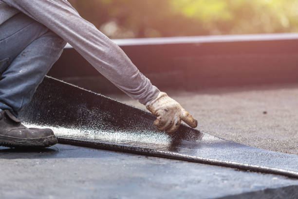 Professional Basement Waterproofing technician working in Oakland, TN
